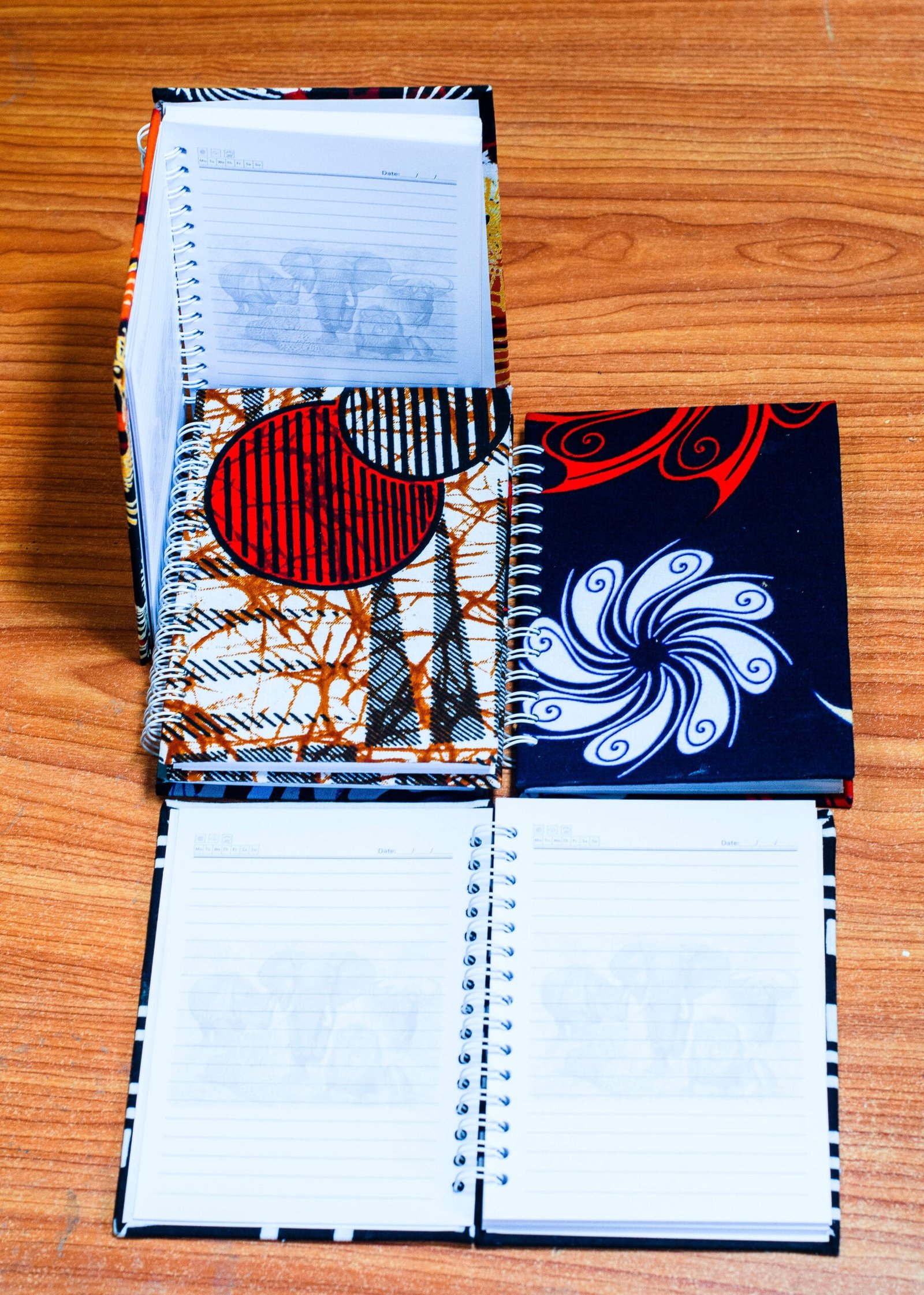 KITENGE NOTE BOOK SMALL African Kitenge print notebooks with colorful fabric covers.