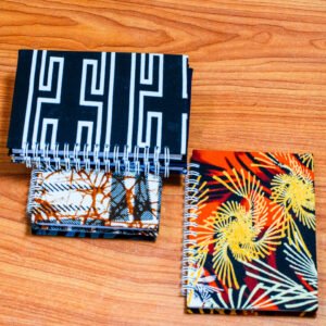 Colorful Kitenge fabric-covered notebooks for writing and journaling