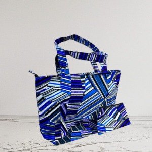 Handmade 2 in 1 Ankara bag with African print fabric and stylish leather finish from Selections Souvenirs