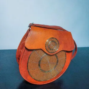 Round leather bag with colorful Maasai beadwork, handmade in Africa