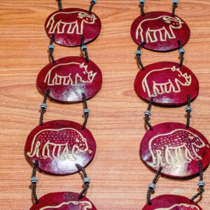Traditional African calabash wall hanging made from natural gourd with cultural designs