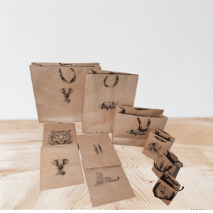 KHAKI GIFT BAGS 1 ompact and perfect for jewelry, keychains, and small souvenirs.