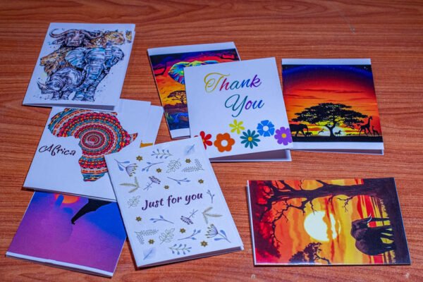 African-themed souvenir greeting and postcards featuring Maasai culture and wildlife