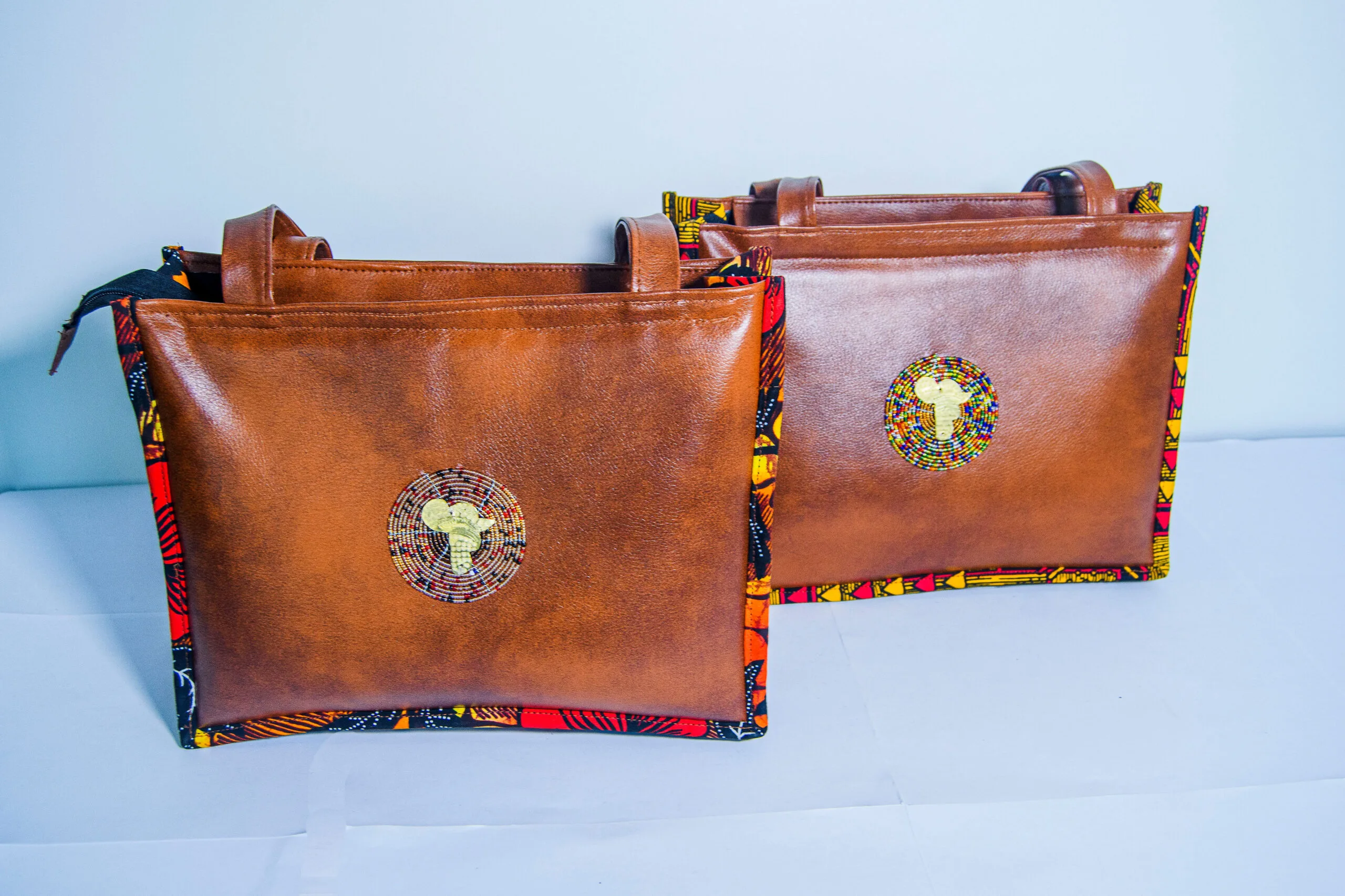 Small kitenge leather bag in rectangular design with bright African prints