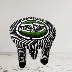Handcrafted African stool made from wood with traditional carvings from Selections Souvenirs